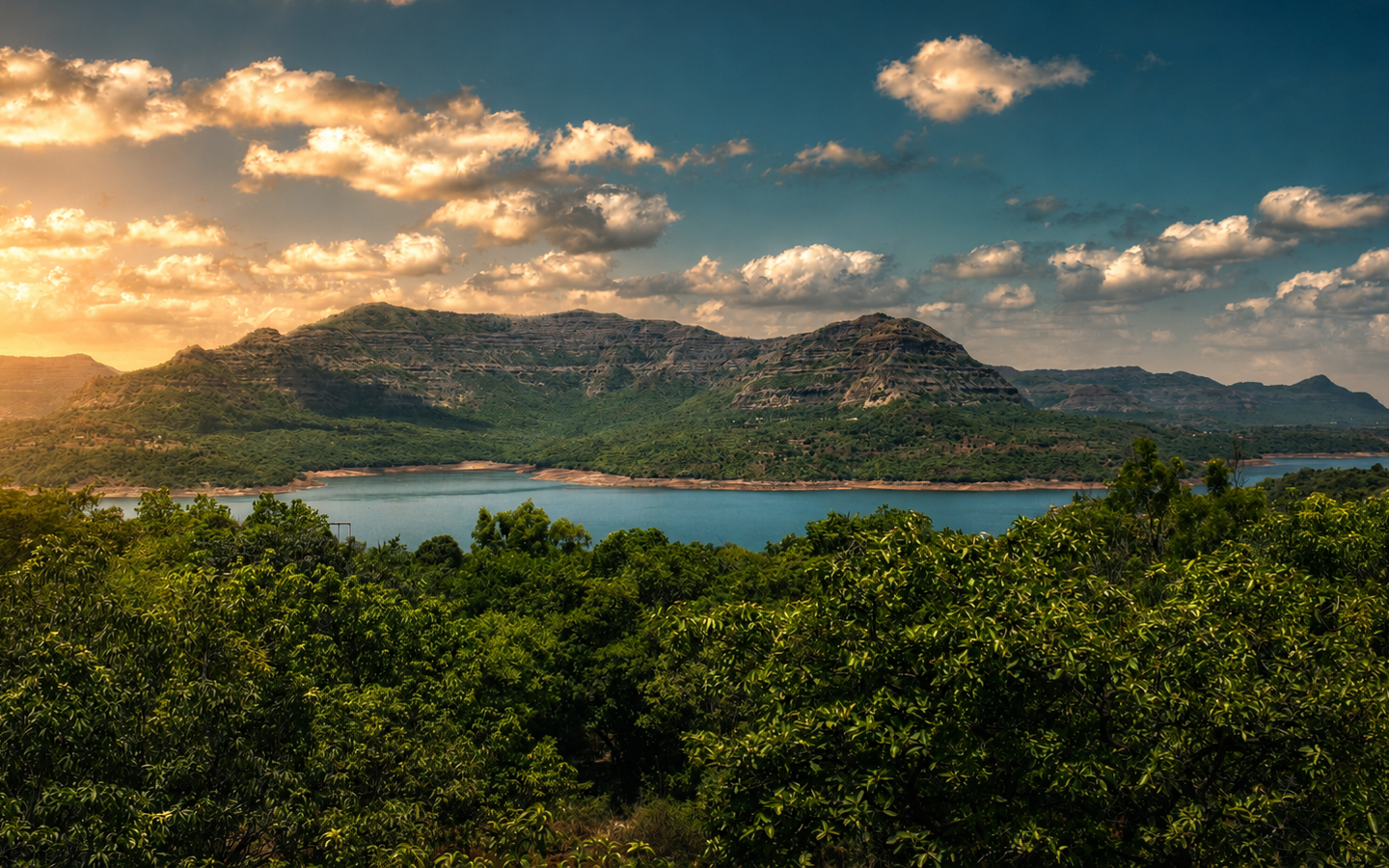 Misty mountain lake at sunrise